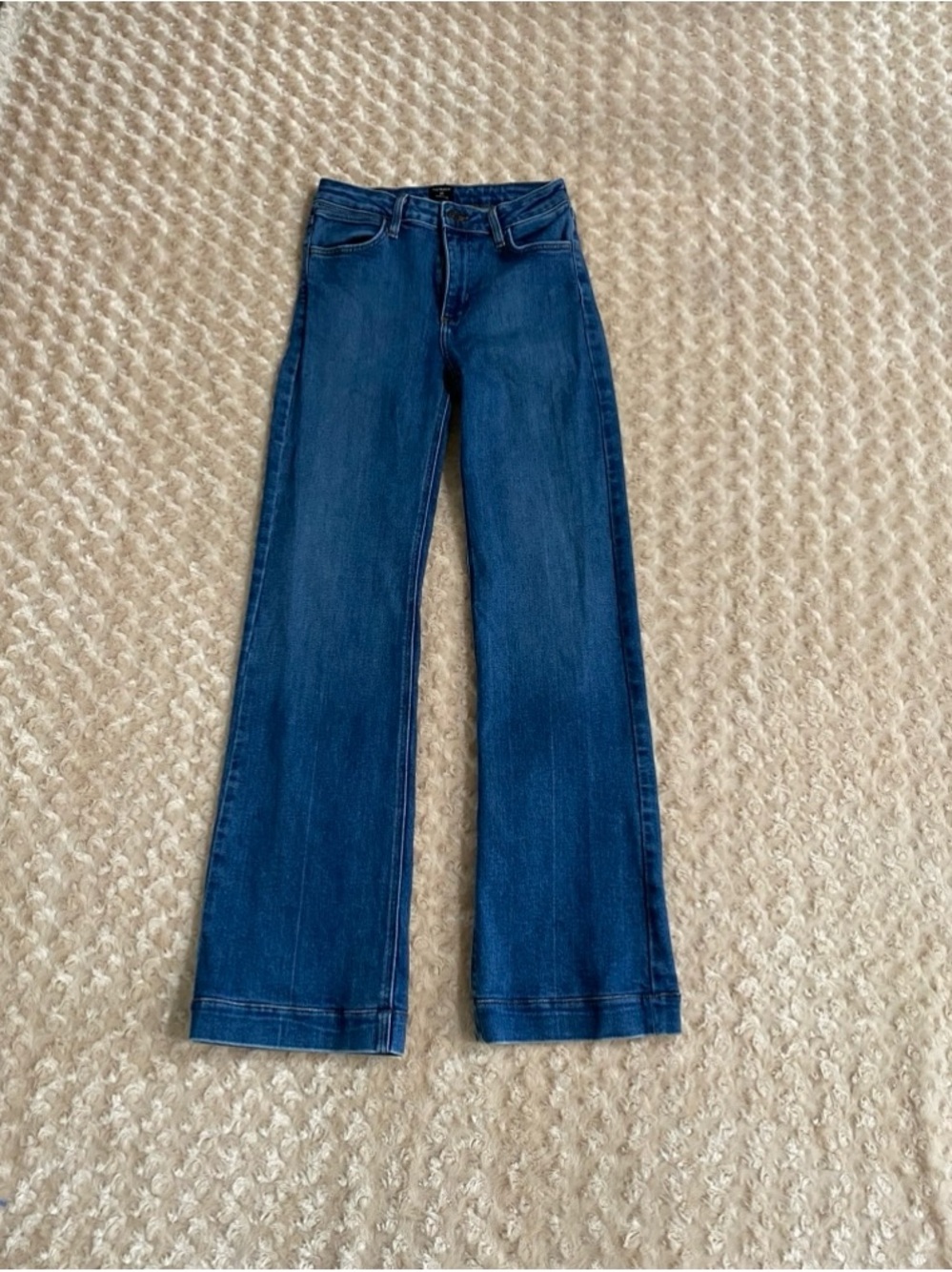 Just Black waist 27 High-rise jeans feature a distinct flared wide-leg silhouett